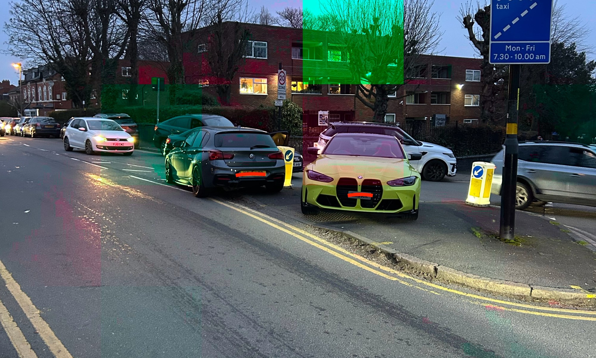 Cars parked on the pavement and central reservation at Park Road, Moseley